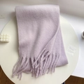 Thick lavender purple knit winter scarf with long fringe tassels in a flat lay view - Solid Purple