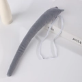 Detailed view of a soft grey faux fur animal tail accessory with an elastic waist band - Wolf Tail