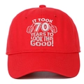 Detail of red cotton baseball cap with 70th birthday embroidery and two fist icons - Red
