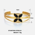 Detail view of 18k gold plated stainless steel cuff bracelet with size and weight specs - Gold Black Four Leaf Clover