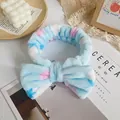 Blue and pink tie-dye coral fleece headband with oversized bow for skincare routines - Blue Pink White Tie-Dye