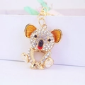 Portachiavi a forma di koala dorato con cristalli luminosi e dettagli in smalto arancione - Koala / Oro