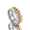 Detail shot of two-tone metal spinning ring with golden cuban chain and textured edges - Number 7 / Steel + Gold