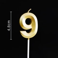 Macro shot of gold number 9 birthday candle with matte finish, 4.8cm height detail - Gold Number 9