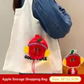 White folding shopping bag with red apple-shaped storage pouch and Good Time print - Apple Shaped Storage Bag