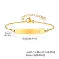 Detail of adjustable gold stainless steel bracelet with polished bar and sunburst motif - Style 32 Adults (Gold/Sunburst/Stone-set Plate)