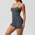 Detail showing side pocket on high-waist grey yoga shorts with moisture-wicking fabric - S / Top And Bottom - Graphite Gray