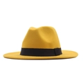 Classic yellow wool felt jazz hat with a black ribbon band and wide brim on white background - M (56-58cm) / Yellow
