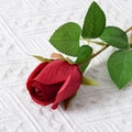 Single artificial deep red rose with green leaves and realistic velvet fabric texture - Rose Bud (Wine Red)