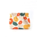 Mini floral squeeze pouch for lipstick storage with orange and yellow abstract print - Squeeze Top Style / Colorful Orange