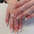 Close-up of white French almond press-on nails with red and pink heart patterns - No Accessories Style / X-0426 White French Heart