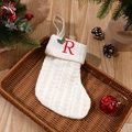White cable knit Christmas stocking with red embroidered letter R for holiday decor - Letter R