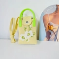 Detail of yellow knit phone bag with floral pattern and bright green handle grip - Beige Romantic Sakura Mobile Phone Bag