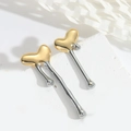 Asymmetrische Herzohrringe in Gold und Silber mit fließenden Lava-Quasten-Details - Langes Lava-Herz