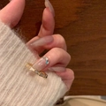 Luxurious gold-plated ring with white mother of pearl and zircon worn on a hand - J5168-Shell Zirconia Style