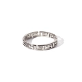 Macro detail of silver stainless steel ring featuring Greek meander pattern cutout design - US 7
