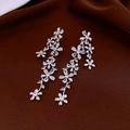 Macro shot of silver vintage flower drop earrings with sparkling zircon crystals - 22# Silver Multi-Layer Flower Rhinestone Tassel Style (22#)
