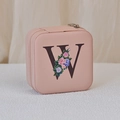 Pink square portable jewelry box with floral letter W print and zip closure - Print W