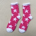 Soft pink coral fleece floor socks with white stars and warm plush fabric for women - One Size / Pink With White Stars