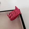 Pink matte hair claw clip with black abstract patterns on elegant display tray - Small Rose Red