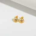 Detail of gold-plated hollow round earrings featuring colorful star-shaped cubic zirconia - Pentagram