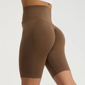 High-waisted seamless scrunch butt lifting yoga shorts in deep brown finish - Coffee