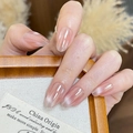 Handmade press-on nails with black polka dots and rhinestones in long oval shape - By2374 Cat's Eye Elegance / Glue Type