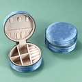 Blue velvet round jewelry organizer for travel with rings slots and zipper closure - Pearlescent Blue / 10x10x5cm