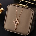 Rose gold key pendant necklace with dancing stone on a premium jewelry gift box - Rose Gold