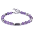 Detailed macro view of purple beaded bracelet with silver hexagonal metal accent and clasp - Amethyst Bracelet