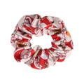 Detail of Christmas scrunchie with festive Santa, stars and gift box prints on white fabric - Beige