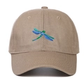 Close-up of khaki baseball cap featuring detailed blue and green dragonfly embroidery - Khaki