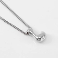 Polished silver bubble bean pendant necklace with classic curb chain on white background - Steel Letter L