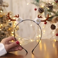 Brown reindeer antler headband with white fur balls and gold stars for Christmas - Star Antlers Brown