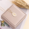Detail of copper micro-set zircon Virgin Mary pendant with mother of pearl on jewelry box - Mother-of-Pearl Background Oval Style (7#)