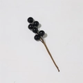 Close-up of artificial black berries on a textured brown stem for DIY floral arrangements - 6 Berries Stem / Black