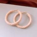 Detailed view of pink wool-wrapped hoop earrings with elegant gold metal clasps - Silver Earring Post - Coffee