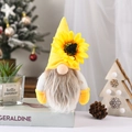 Detail of sunflower gnome plush with yellow knit hat and white beard in cozy home decor - Yellow Hat Style