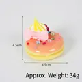 Realistic orange-pink donut keychain with cream, pink bow, and colorful pearls - Artificial Pearl Donut Decoration (With Gold Bead Chain) / 4.50cm / Coral