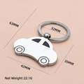 Sleek silver car-shaped metal keychain with black windows and polished finish - x-036 Flat Car