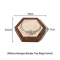 Hexagon walnut jewelry tray with beige velvet lining and silver flower charm bracelet - Walnut Hexagon Bracelet Tray - Beige Velvet
