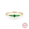 Macro detail of 925 sterling silver ring with five green zircon stones in gold finish - Green Zirconia 5-Stone Row Gold Style (Style 7-Green)