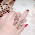 Luxurious open butterfly ring in rose gold with pink crystals and zircon stones - Adjustable Open / Gold Pink Zirconia