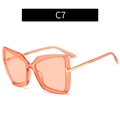 Oversized butterfly sunglasses with translucent orange frames and slim gold metal temples - Pink Frame / Pink Lens