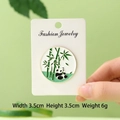Cute enamel panda brooch with bamboo design, 3.5cm round metal badge for clothing - Panda Under Bamboo