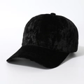 Close-up detail of high-quality black velvet texture on the stylish baseball cap - One Size / Black