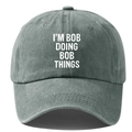 Washed cotton vintage baseball cap in dark grey with I'M BOB DOING BOB THINGS text - Adjustable / Gray