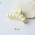 Matte cream large hair claw clip with hollow design for minimalist styling - Off White