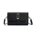 Black crossbody bag with woven texture flap and metallic buckle on white background - Black