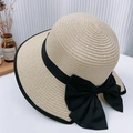 Beige straw sun hat with black ribbon and large bow detail for beach vacation - Beige Back Bow